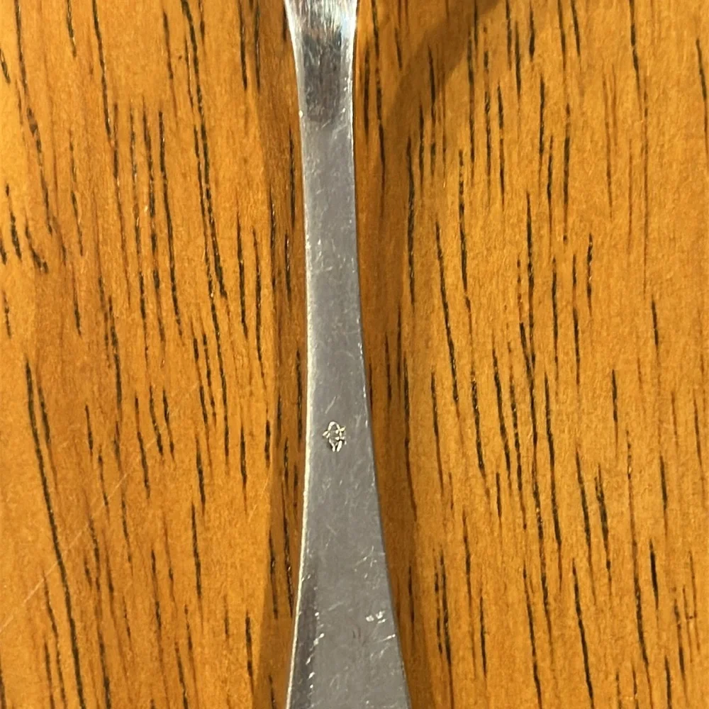 CV silver fork and spreading knife with the same pattern. Early 1900’s